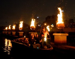 waterfire fire dancer on boat